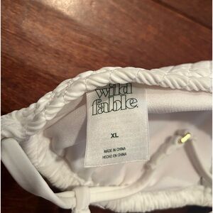 white triangle bathing suit top